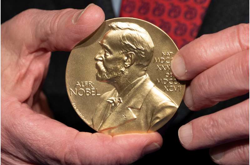 A close-up view of a Nobel Prize medal at the National Institutes of Health (NIH) in Bethesda, Md., Tuesday, Dec. 8, 2020. Credit: AP Photo/Jacquelyn Martin, File The Nobel Prize in medicine goes to 3 scientists for work on peripheral immune tolerance
